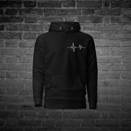 Black Story Interrupted Hoodie front view with ECG heartbeat awareness design.