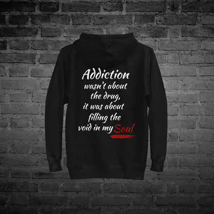 Black Filling the Void Hoodie flat lay back view with “Filling the Void” text design.